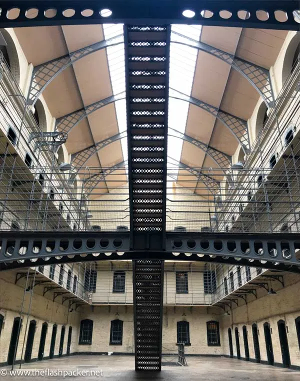 Solo Travel in Europe: The Best Places to Go Alone (2026) 20 interior of kilmainham gaol with galleried cells and staircase