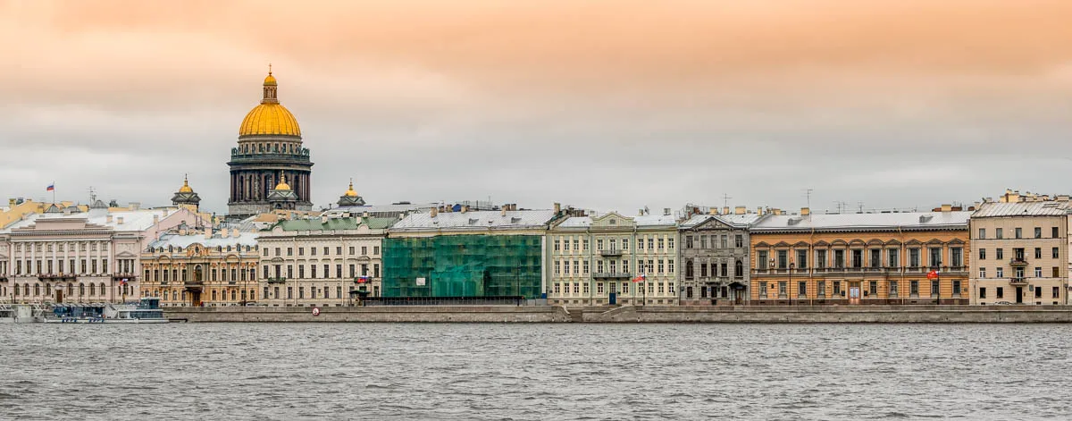 Solo Travel in Europe: The Best Places to Go Alone (2026) 27 buildings along riverfront in st petersburg at sunset